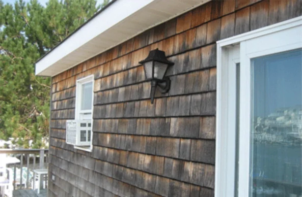 Cedar shingle siding before washing, gray and stained